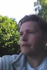 Пол Теннис